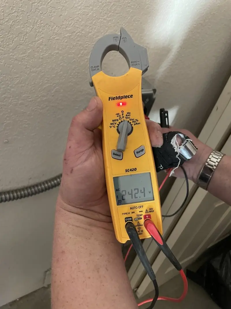 Voltage testing with clamp meter during Aluminum Wiring Replacement in Perrysburg